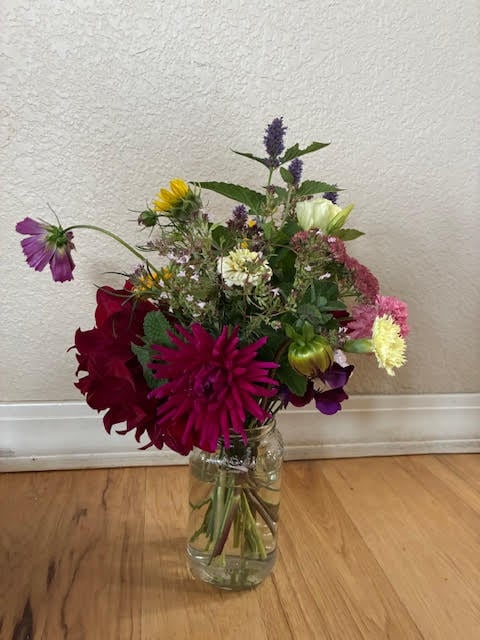 colorful bouqet with dahilas, carnatio, cosmost, sunflower, sweetpea, anise hyssop