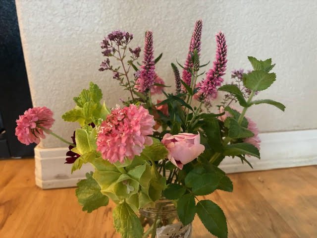 bouquet with pink and green colors - veronica, mint, scabiosa, rose, bells of ireland